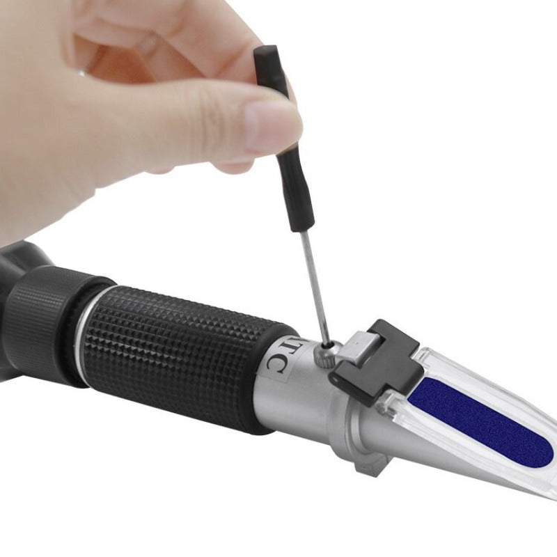 Handheld alcohol refractometer measures alcohol content and sugar concentration in wine, beer, and grapes up to 32% alcohol and Brix.