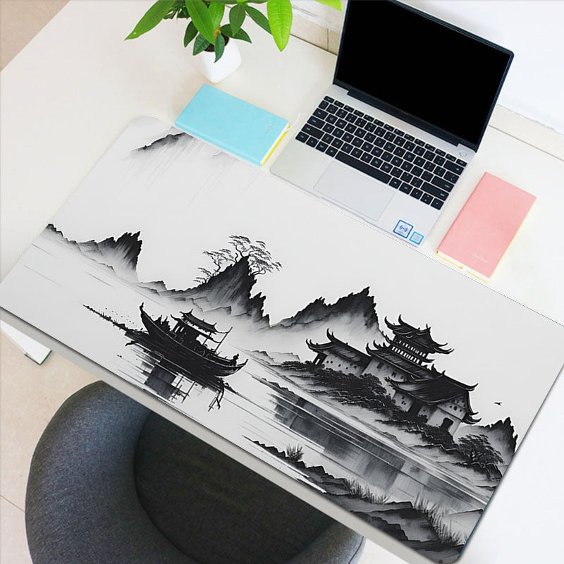 Large gaming mouse pad with landscape ink painting design, made of natural rubber with anti-slip feature. Perfect for office use.