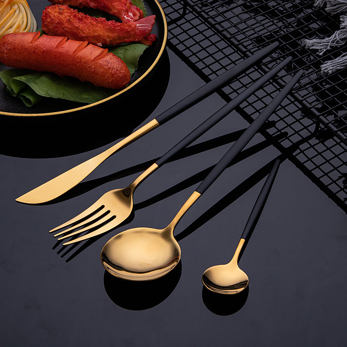 30-piece stainless steel cutlery set with elegant golden and black design. Durable and dishwasher safe, suitable for everyday use.