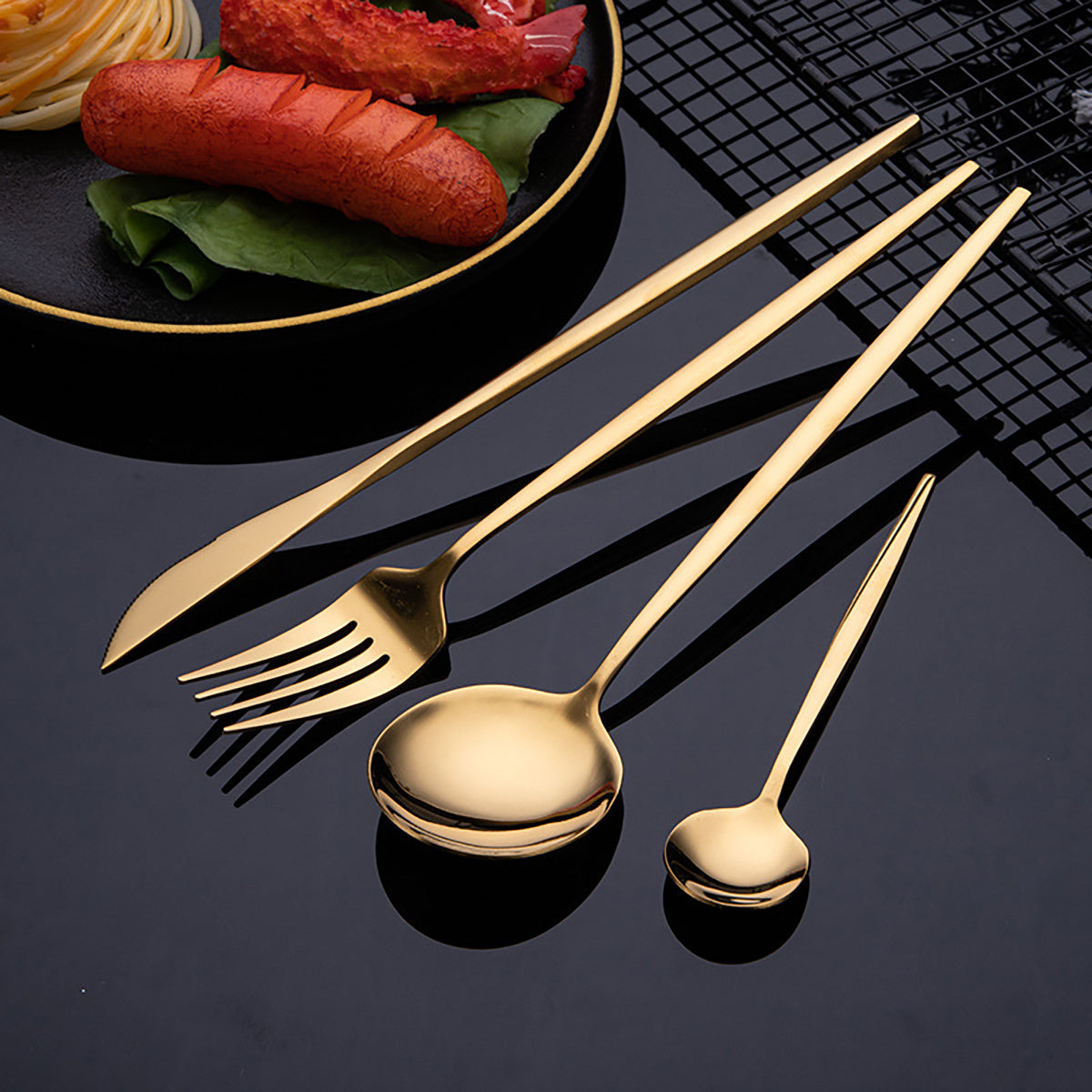 30-piece stainless steel cutlery set with elegant golden and black design. Durable and dishwasher safe, suitable for everyday use.