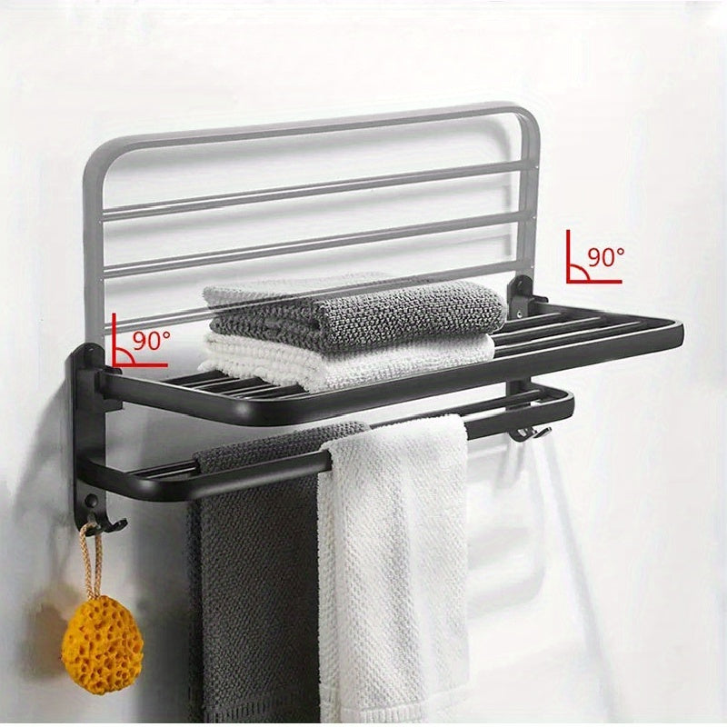 Compact black wall-mounted bathroom shelf with towel bar and hooks for convenient storage of towels, toiletries, and accessories. Easy to install with a sleek modern design and sturdy metal construction. Perfect towel holder for any bathroom.