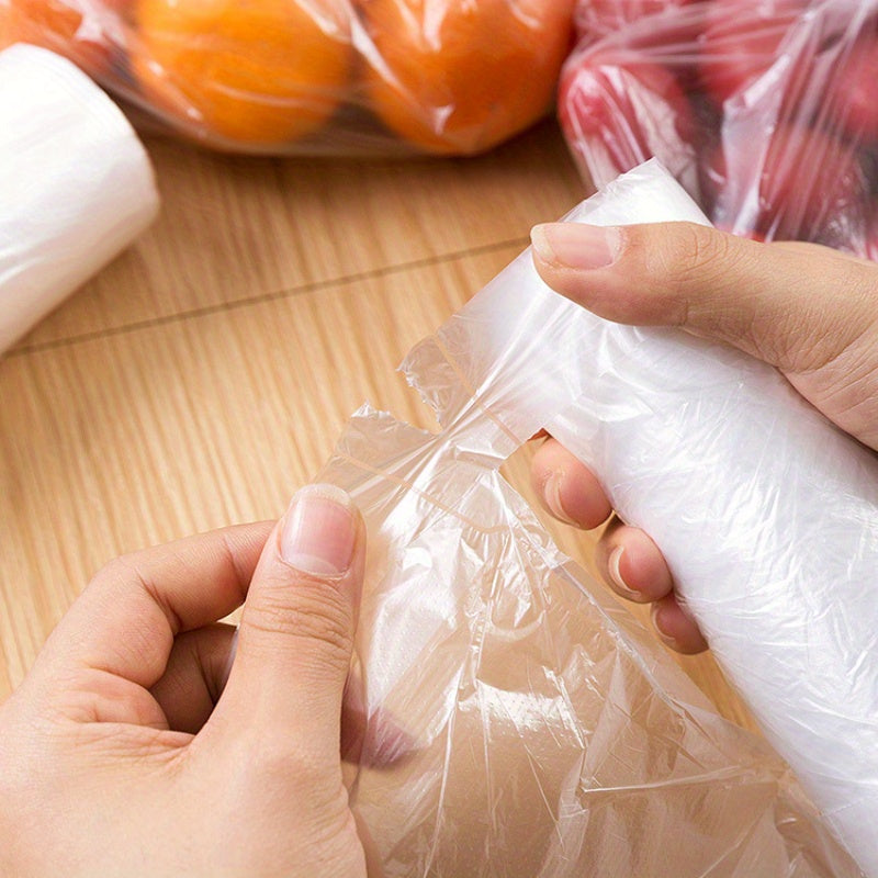 Keep your food fresh on-the-go with 100 leak-proof fresh-keeping bags! These portable disposable shopping bags are perfect for storing produce and other kitchen supplies. Say goodbye to spoiled food with these reusable plastic storage bags.