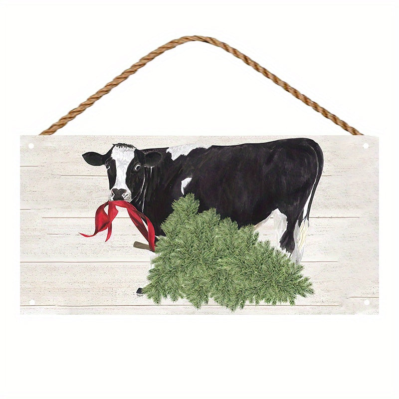 Wooden sign for Christmas on the farm featuring a cow with a tree, perfect for hanging on the wall.