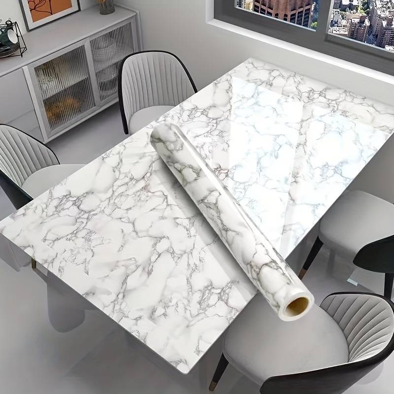 Smooth and stylish, this self-adhesive wallpaper roll features a marble pattern design. It is waterproof, heat-resistant, and oil-resistant, making it perfect for kitchens and bathrooms. This easy-to-apply sticker is great for furniture refurbishment.