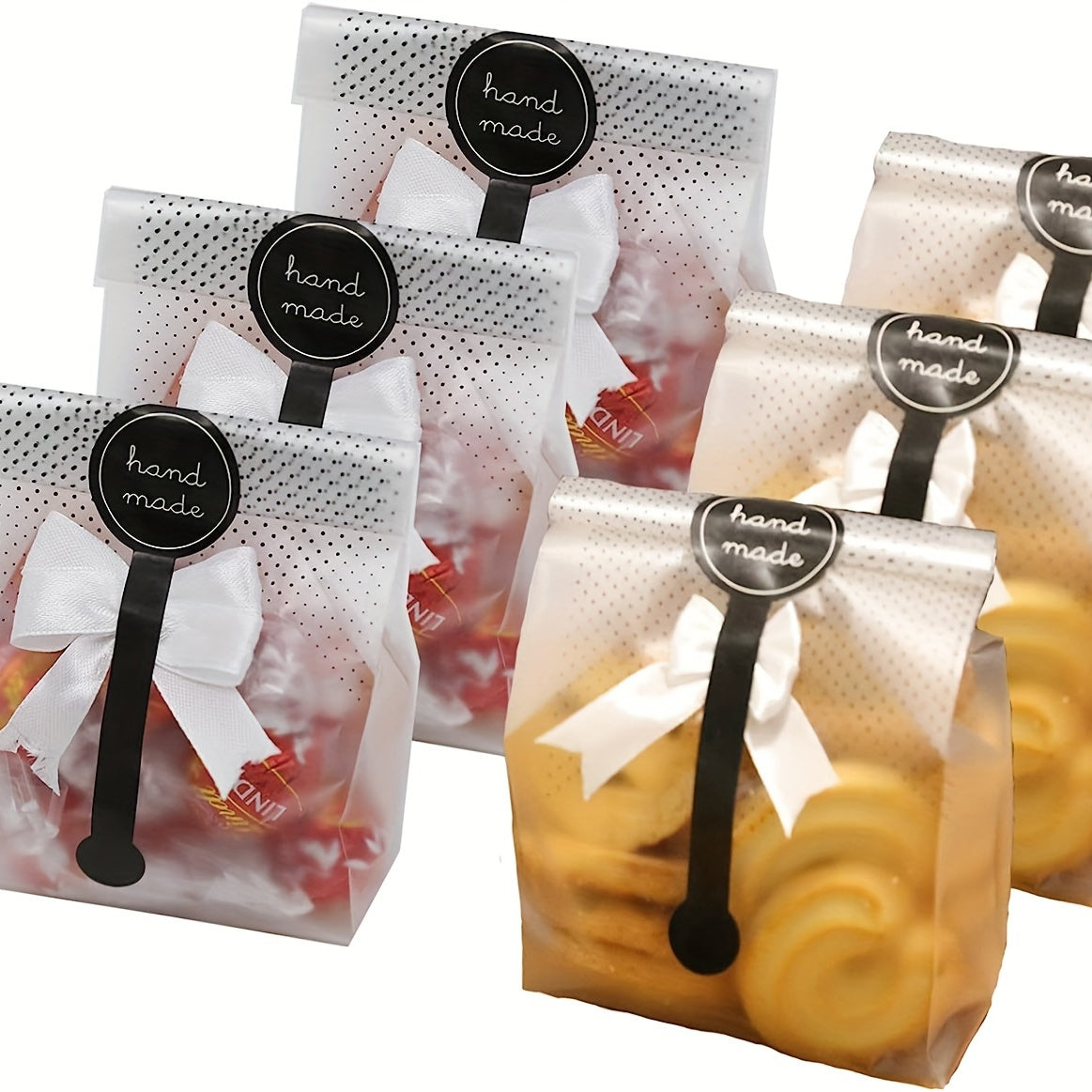 Translucent plastic candy bags, ideal for packaging 100 pieces of biscuits. Perfect for Valentine's Day gifts or snacks like mini bread, bundle cake, and hot cocoa bombs. Includes stickers for sealing.