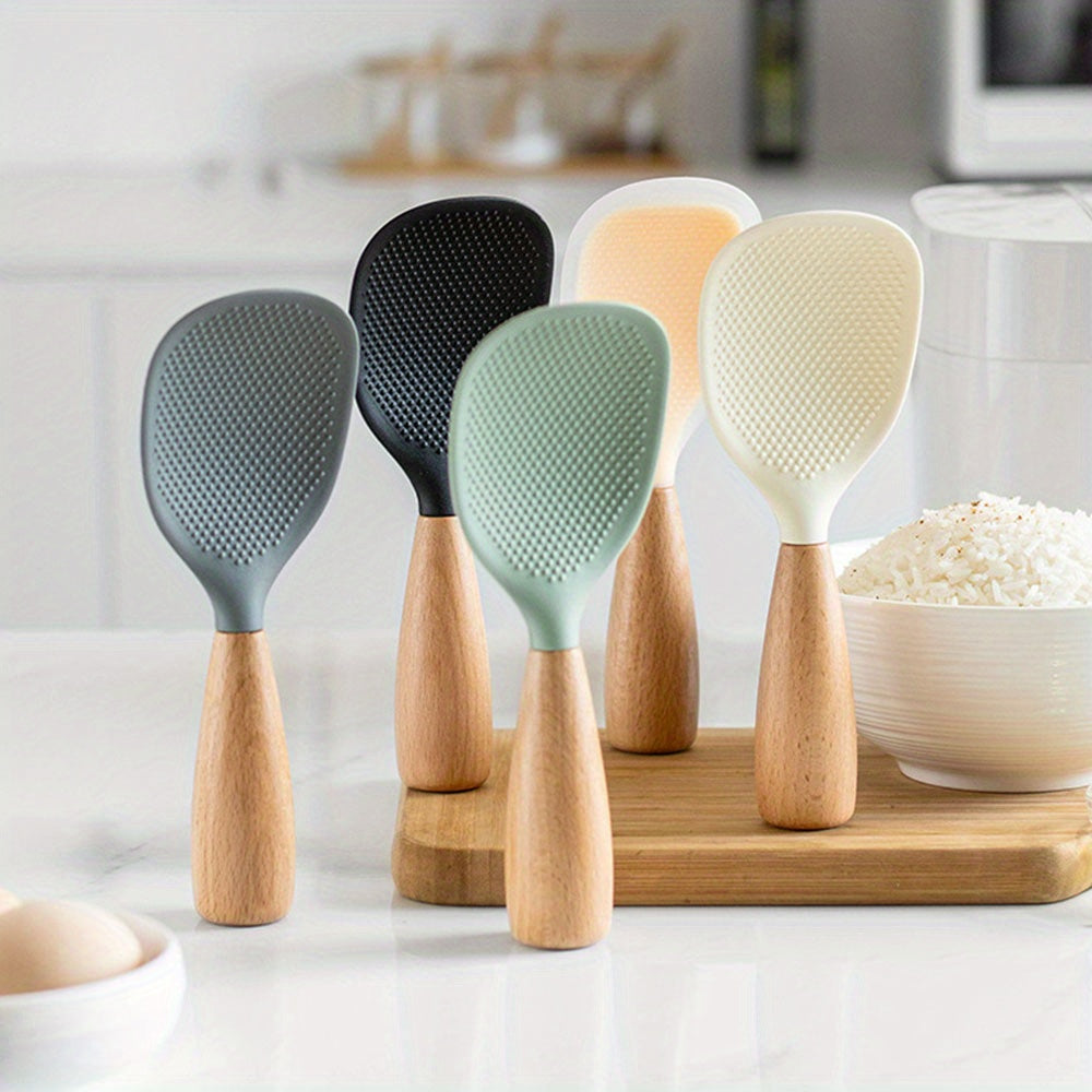 Silicone spoon with wooden handle, ideal for nonstick pans, rice cookers, and various cooking needs in home kitchens, school dormitories, and more.