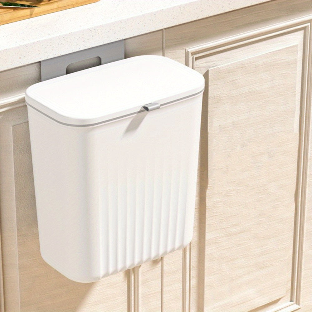 Wall mounted trash can with adhesive hook, large capacity hanging bin for kitchen organization. Perfect for home and office use.