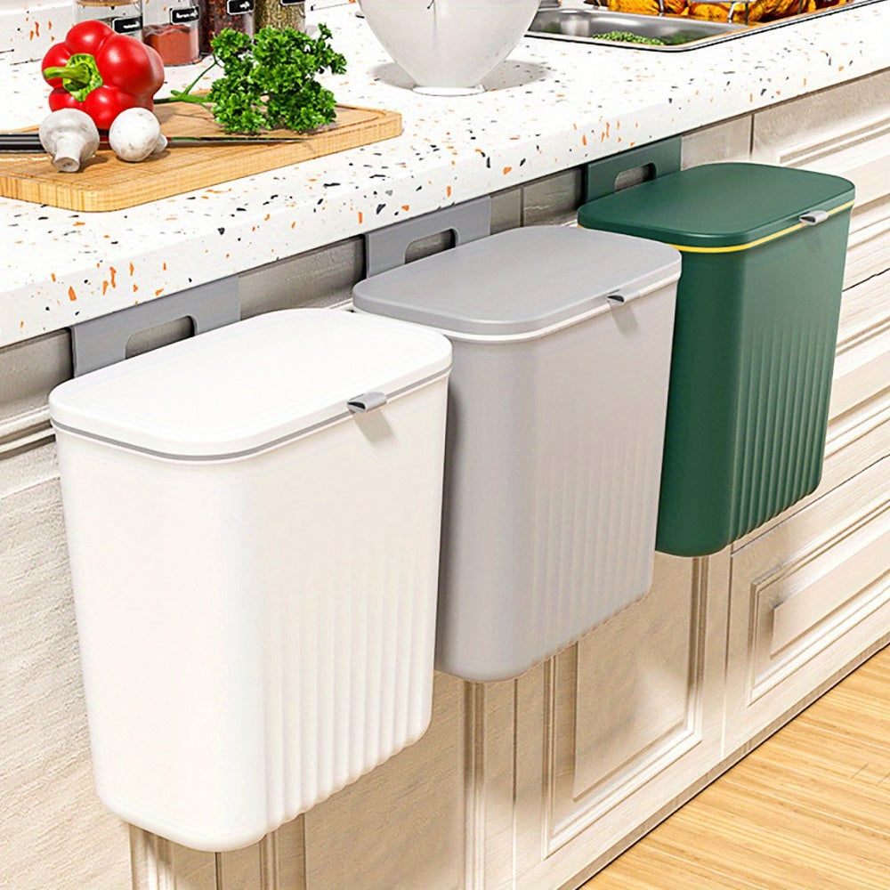 Wall mounted trash can with adhesive hook, large capacity hanging bin for kitchen organization. Perfect for home and office use.