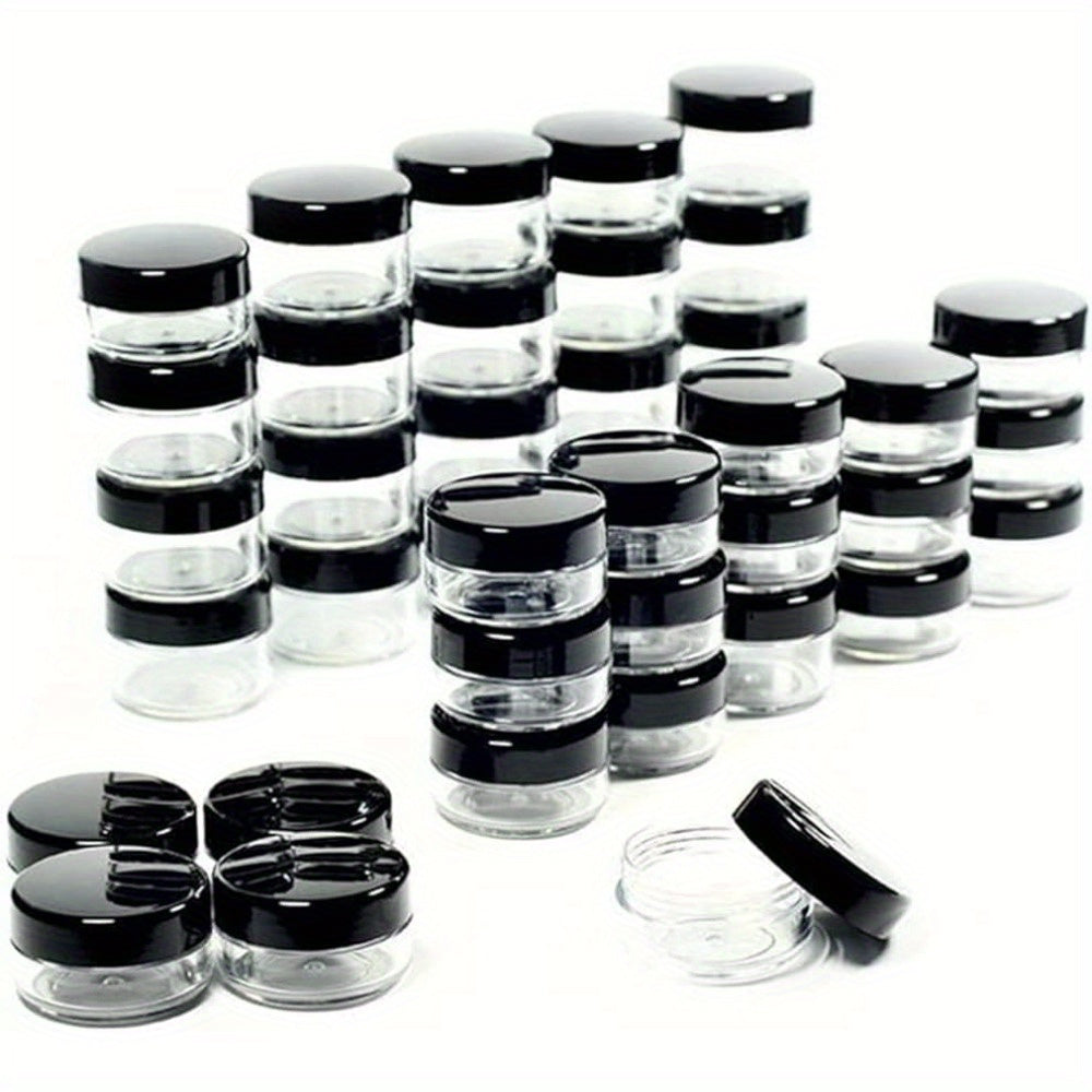 5 grams, transparent mini cream jars with black lids - pack of 10/50. Ideal for storing eyeshadow cream, lip balm, or other cosmetic samples while on the go. Perfect travel essential for beauty enthusiasts.