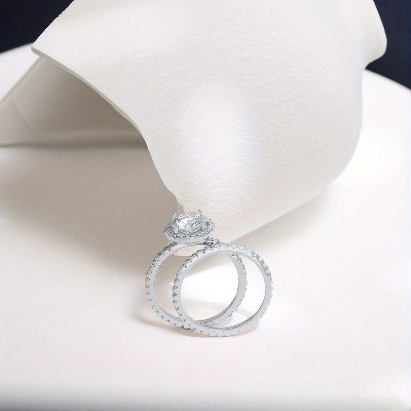 2 carat Moissanite stacking rings made of 925 sterling silver featuring a trendy halo design. Perfect for engagements or weddings, this high-quality jewelry comes with a certificate and a gift box.