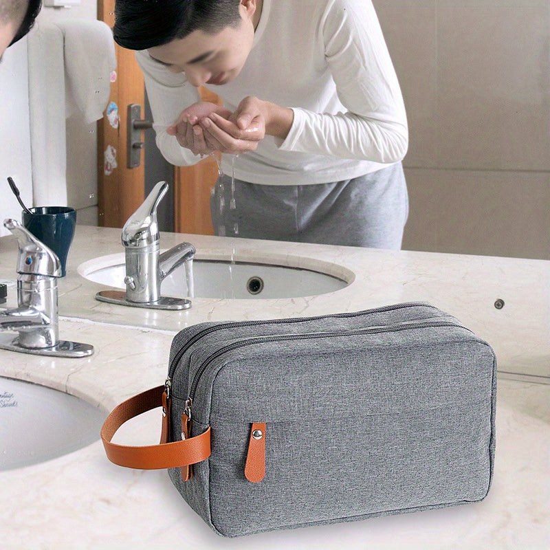 Men's water resistant travel toiletry bag with hanging organizer for toiletries and shaving accessories.