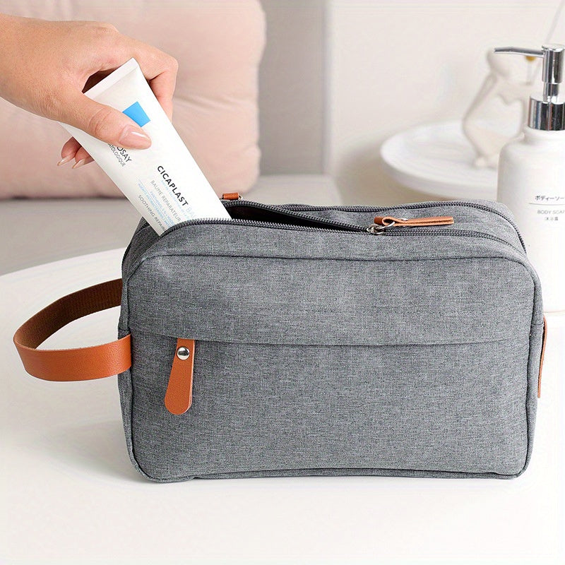 Men's water resistant travel toiletry bag with hanging organizer for toiletries and shaving accessories.