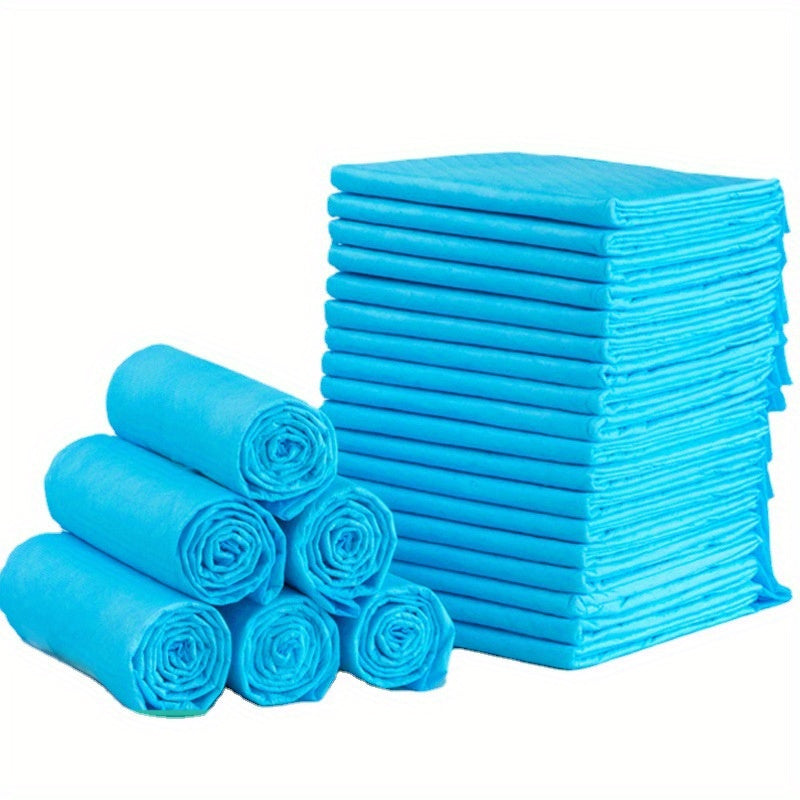 Leak-proof disposable dog training pads for pet hygiene. Absorbent non-woven fabric in light blue, secure fit for house training and incontinence.