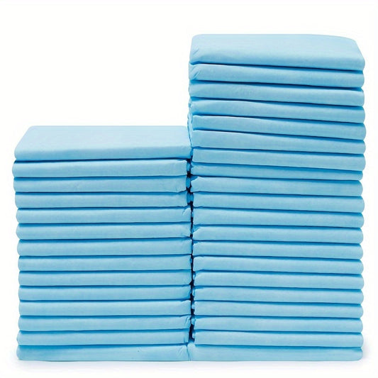 Leak-proof disposable dog training pads for pet hygiene. Absorbent non-woven fabric in light blue, secure fit for house training and incontinence.