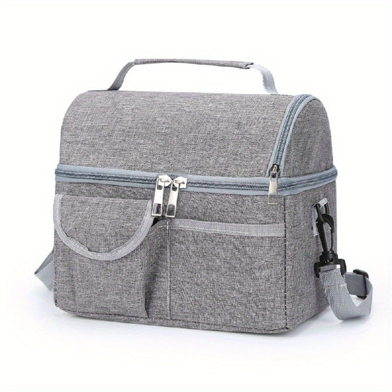 This lunch bag is designed with double layers, providing ample space for your meals. It is insulated to keep your food fresh during picnics or lunches. The bag also includes a separate compartment for bottles and is leakproof with a zipper closure. It