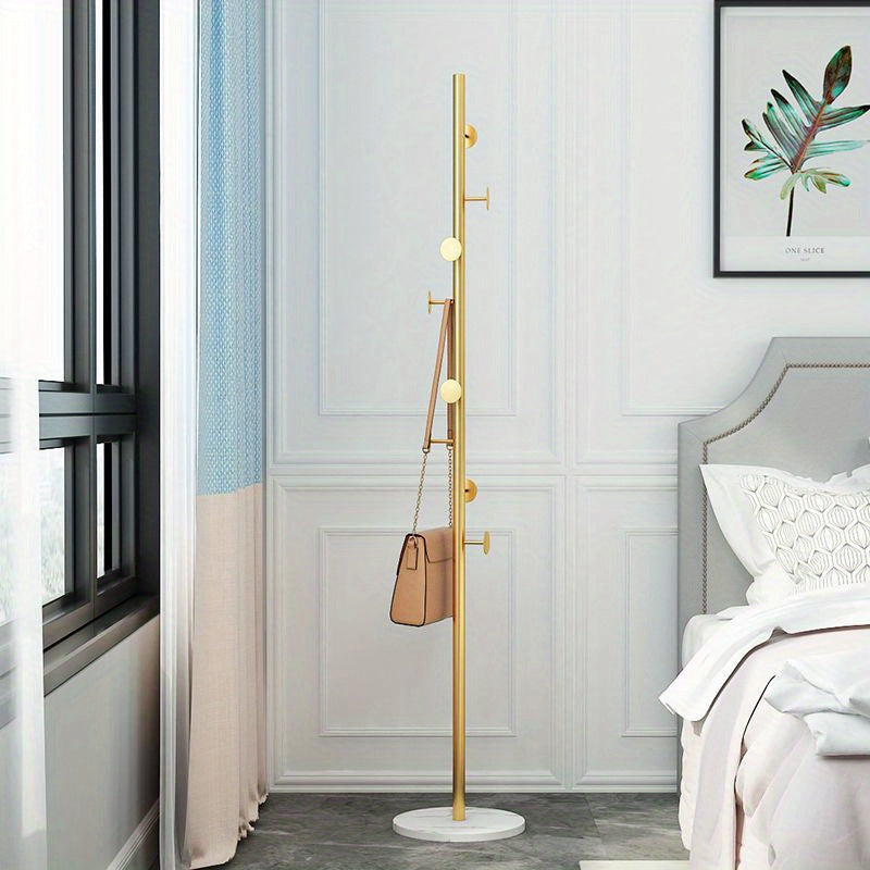 Simple yet luxurious, this rock plate metal hanging hanger is the perfect addition to any bedroom or room. With a floor hanger and coat rack shelf, this clothes hanger is both functional and stylish.