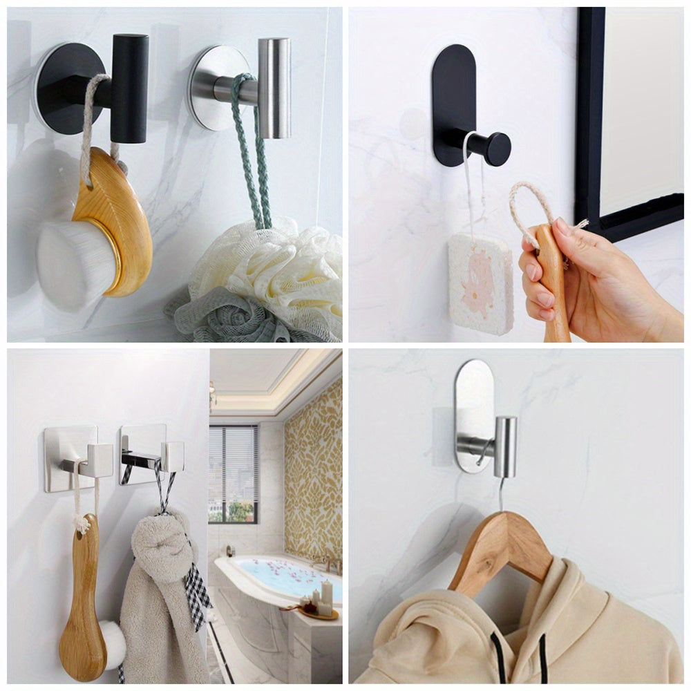 Two sleek black stainless steel self-adhesive hooks for towels and kitchen utensils. Rustproof, no-drill wall mount perfect for home and garage organization.