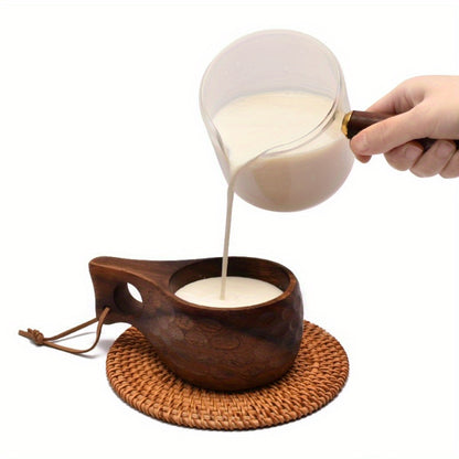 Acacia wood coffee and milk cup with tassel. High-quality, reusable drinkware with rope handle. Perfect for camping and daily use in the kitchen.