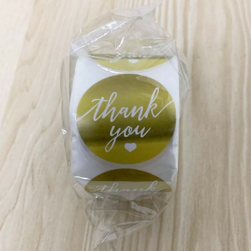 One roll contains 500 pieces of 38MM/1.5IN Golden "Thank You" stickers. These stickers can be used as seal labels for handmade gifts, cakes, boxes, and business commodities. They are also perfect for sealing gift boxes, decorating bags, and adding a