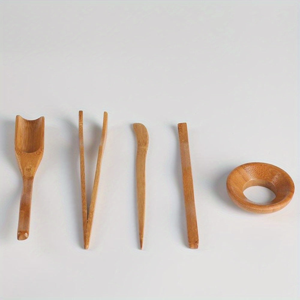 Complete set of Wooden Tea Ceremony Utensils including Bamboo Tea Spoons, Tea Needle, Tea Tweezers Clip, Strainer Tong, and Tube Teaware. Perfect for use in your home, office, or tea room. Essential kitchen tools and tea accessories.