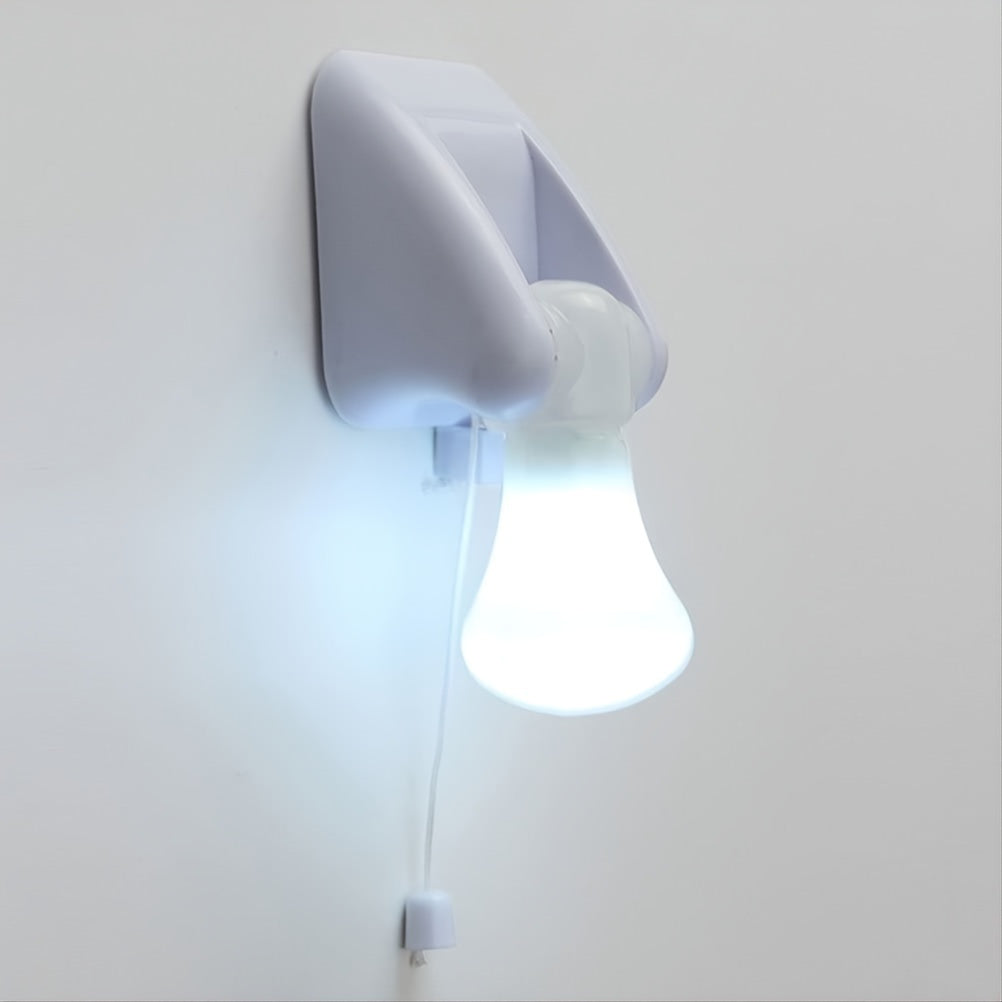 Portable wire LED bulb with pull chain, battery operated, self-adhesive wall mount.