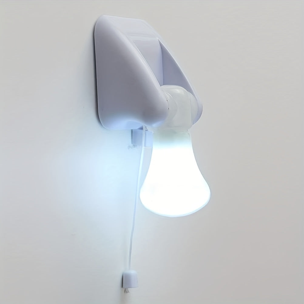 Portable wire LED bulb with pull chain, battery operated, self-adhesive wall mount.