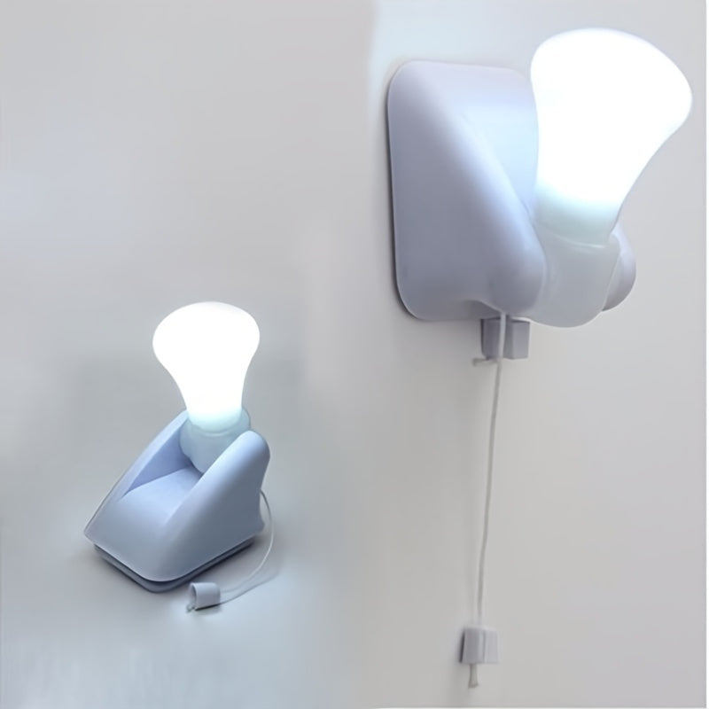 Portable wire LED bulb with pull chain, battery operated, self-adhesive wall mount.