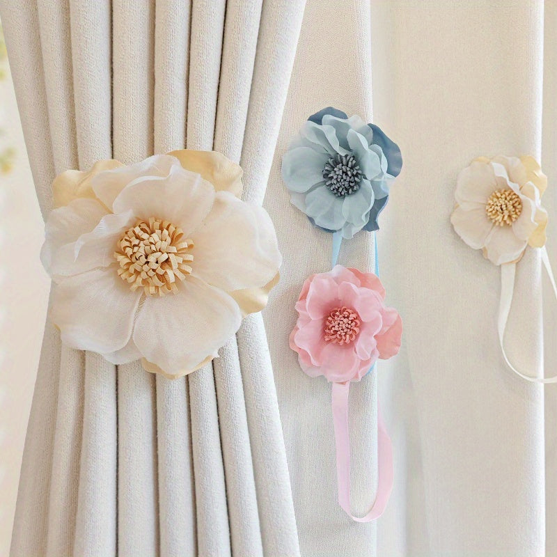 These magnetic curtain straps feature a simple yet stylish three-dimensional flower design. With a magnetic closure, they provide a convenient way to hold back your curtains in the bedroom, living room, kitchen, or any other room in your home. Perfect