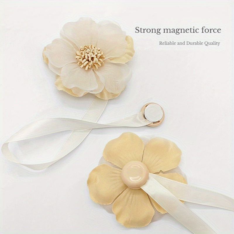 These magnetic curtain straps feature a simple yet stylish three-dimensional flower design. With a magnetic closure, they provide a convenient way to hold back your curtains in the bedroom, living room, kitchen, or any other room in your home. Perfect