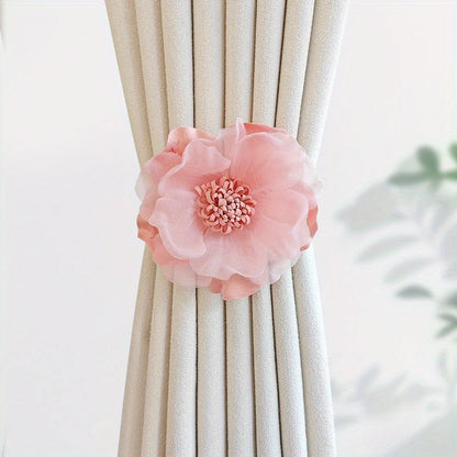 These magnetic curtain straps feature a simple yet stylish three-dimensional flower design. With a magnetic closure, they provide a convenient way to hold back your curtains in the bedroom, living room, kitchen, or any other room in your home. Perfect