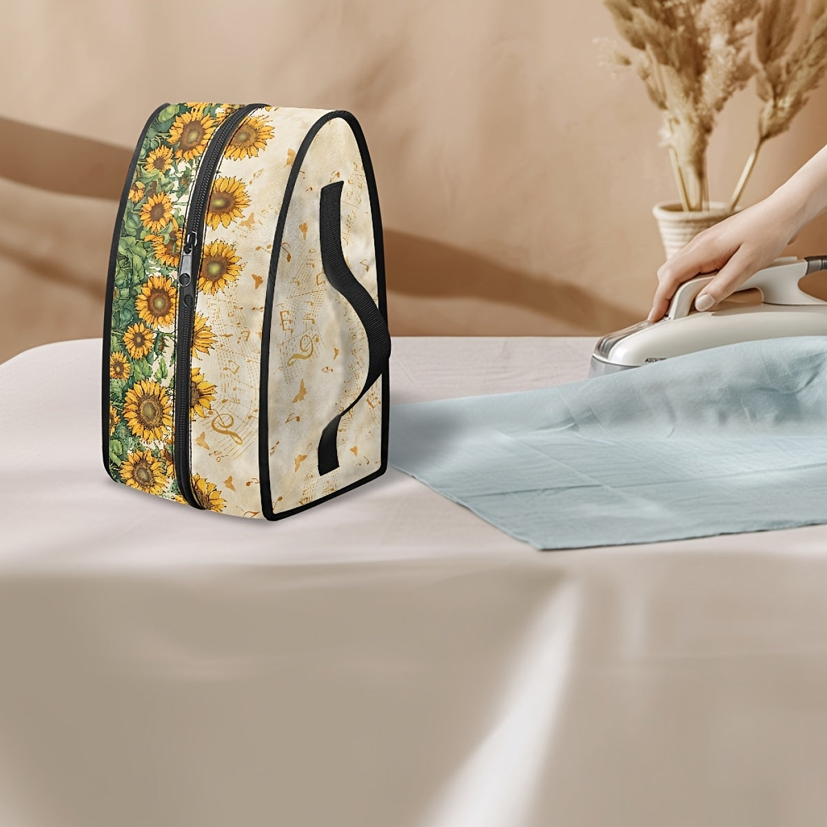 Portable iron storage bag featuring a sunflower pattern with dual zipper closure to keep your iron dust-proof while traveling. This durable organizer includes a handle for easy carrying and is non-electric, perfect for storing ironing accessories.