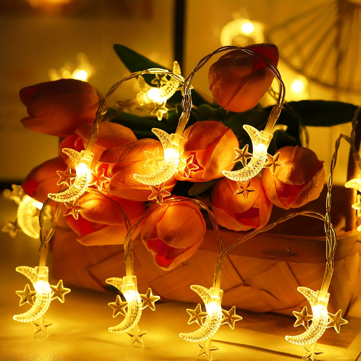 Battery powered star and moon light string for home decor, suitable for various festive decorations.