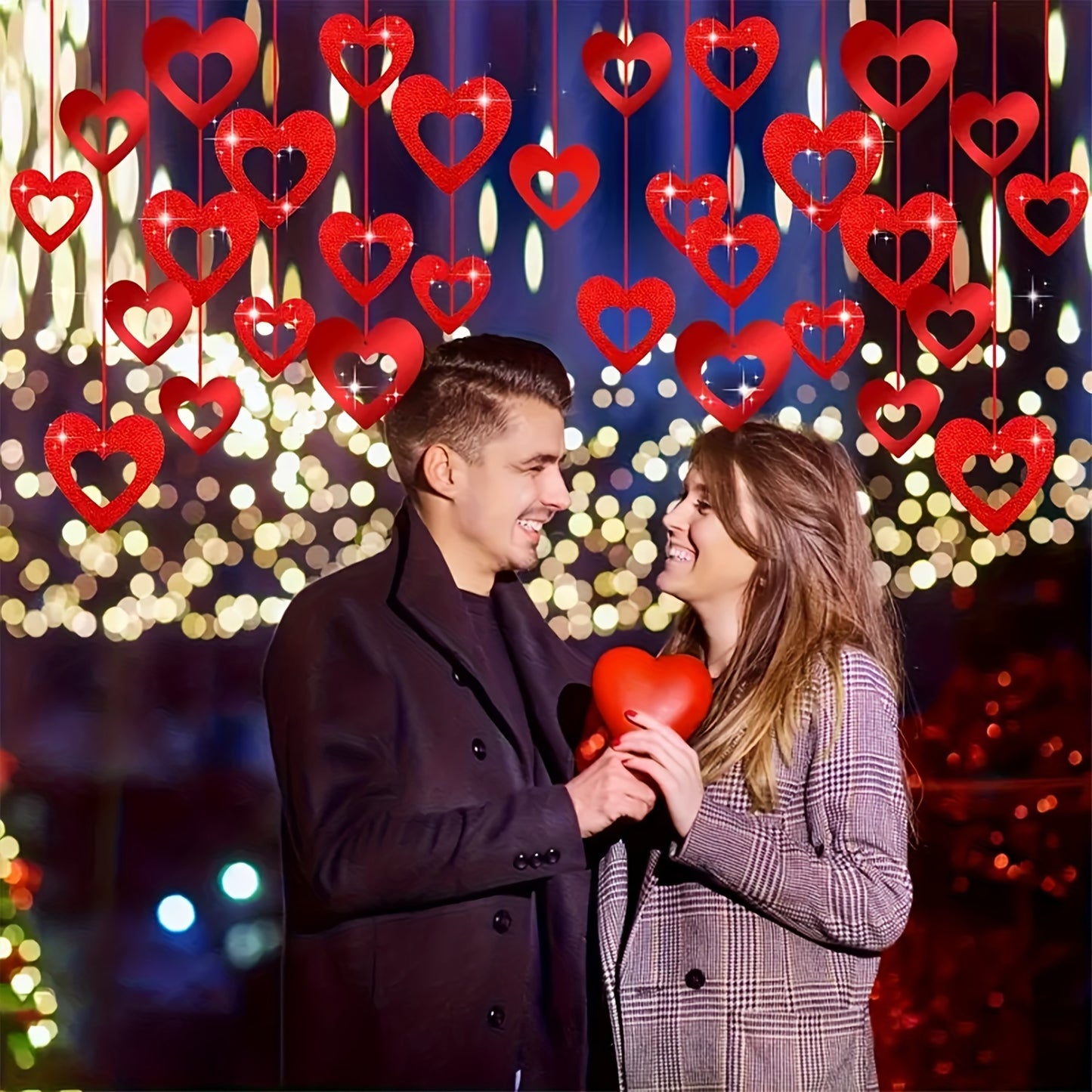 200 Valentine's Day hanging heart decorations. Ideal for weddings, birthdays, parties, and romantic room decor. Made of plastic red hearts and silk strings. Non-electric and featherless.