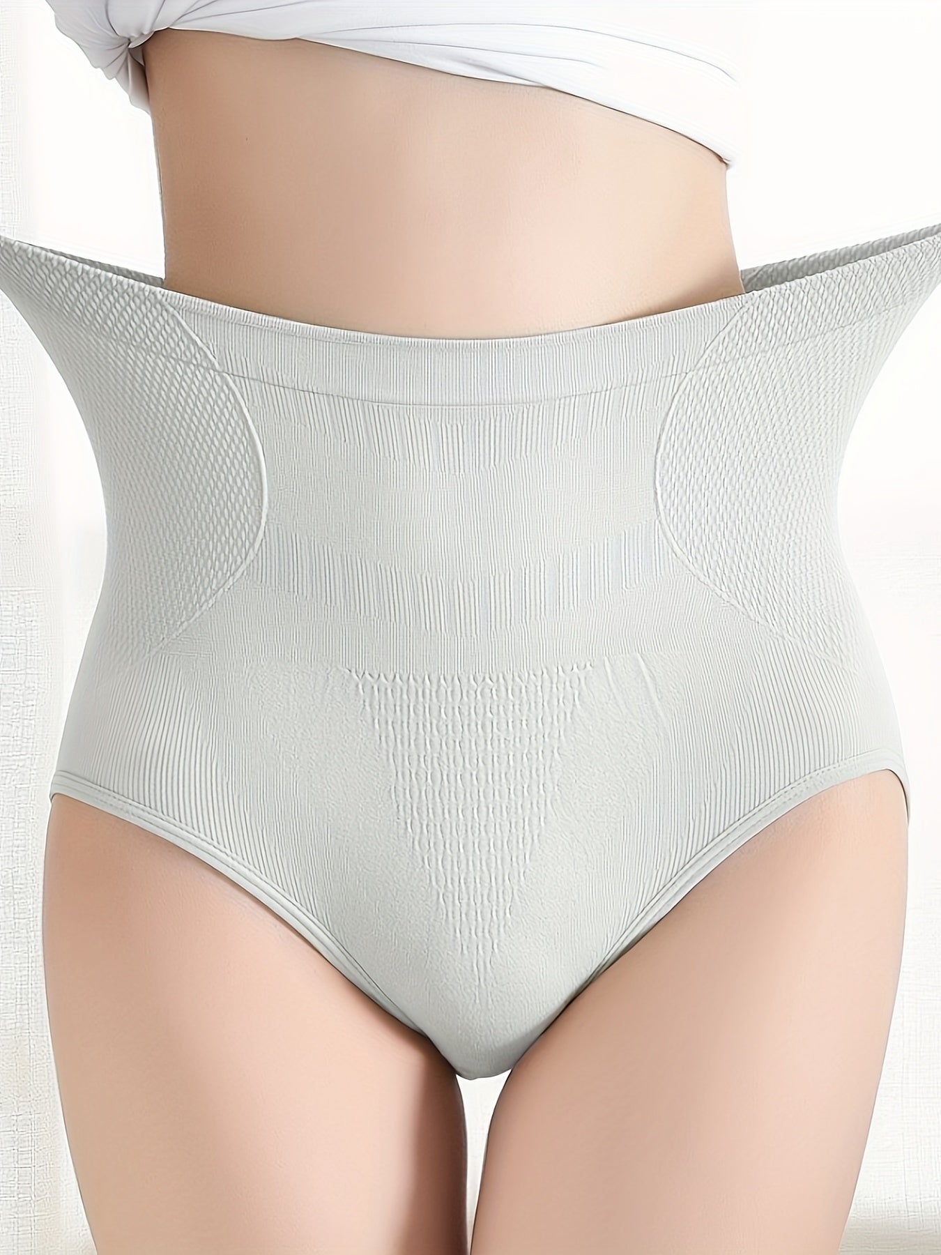 High-Waist Tummy Control Panties that are seamless, breathable, and slimming in Beige color.