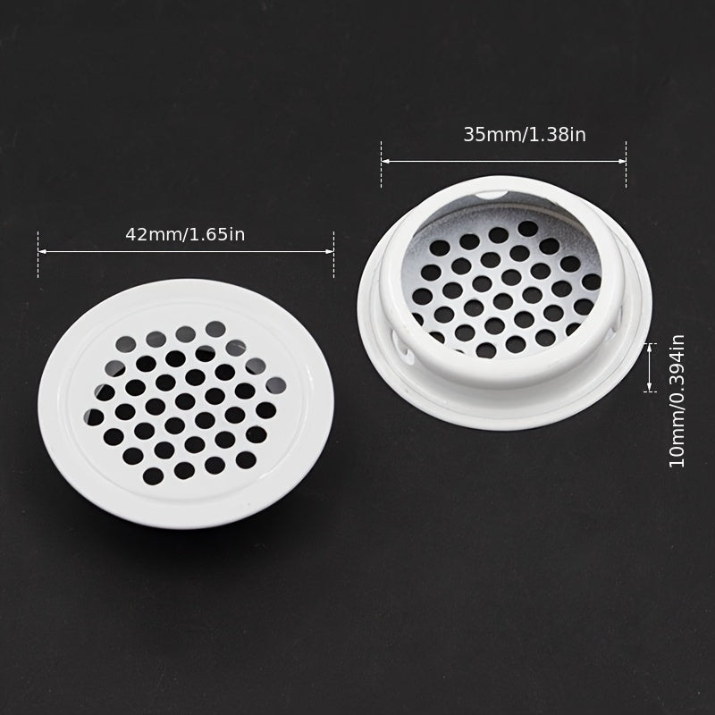 A set of 5 stainless steel circular shoe cabinet vents with flat breathable holes, designed for ventilation and heat dissipation. These golden home accessories also include covers for the ventilation holes.