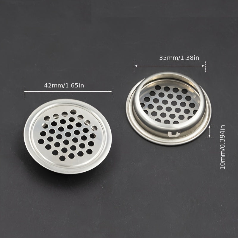 A set of 5 stainless steel circular shoe cabinet vents with flat breathable holes, designed for ventilation and heat dissipation. These golden home accessories also include covers for the ventilation holes.