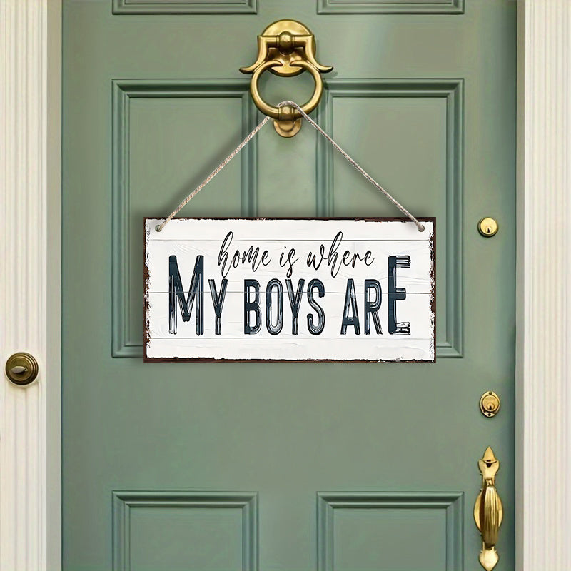 Wooden sign with the words "Home Is Where My Boys Are," a delightful gift idea for a new mom or Mother's Day. This farmhouse-style wall decor is perfect for the bedroom and adds a touch of shabby chic charm. It's a wonderful keepsake and a lovely