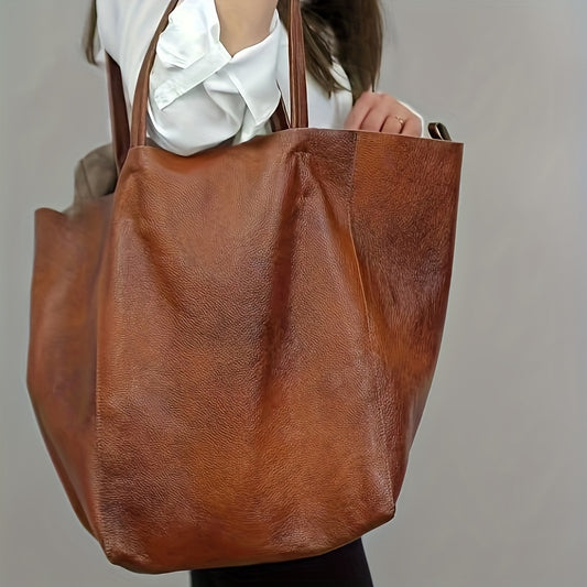 New 2023 large soft tote bag for women in European and American style with spacious design and shoulder carry option.