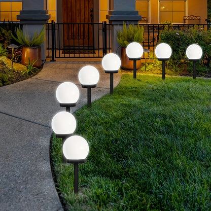 Solar-powered LED garden lights for outdoor landscapes - Durable plastic, automatic on/off, modern design for pathways, yards, decks, lawns, and patios.