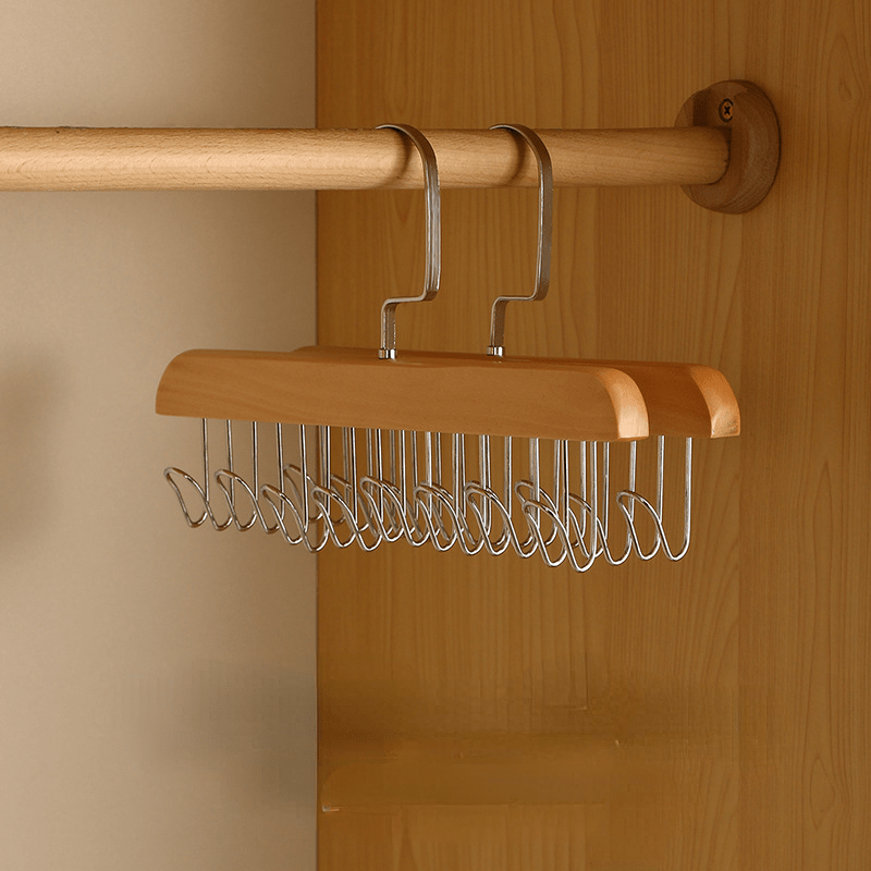 One versatile wooden clothes hanger with hooks for drying and organizing underwear and vests. Perfect for saving space with a vertical storage rack, ideal for home and dorms. Great for hanging clothes.