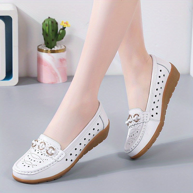 Flat shoes for women with hollow out design, casual and breathable slip-on style, providing comfortable wear.