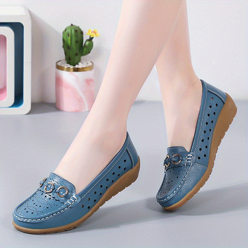 Flat shoes for women with hollow out design, casual and breathable slip-on style, providing comfortable wear.