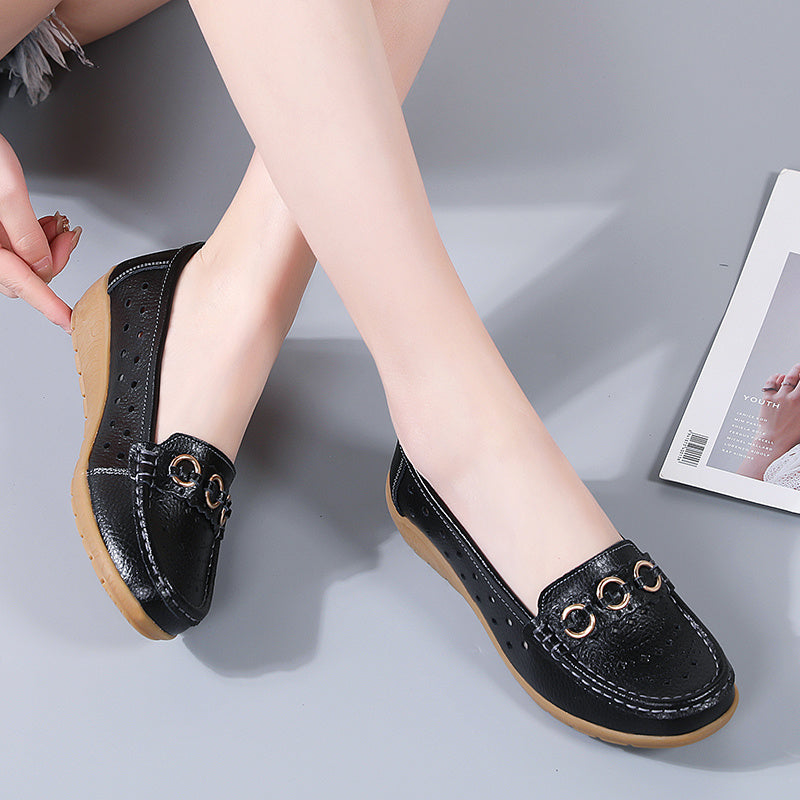 Flat shoes for women with hollow out design, casual and breathable slip-on style, providing comfortable wear.