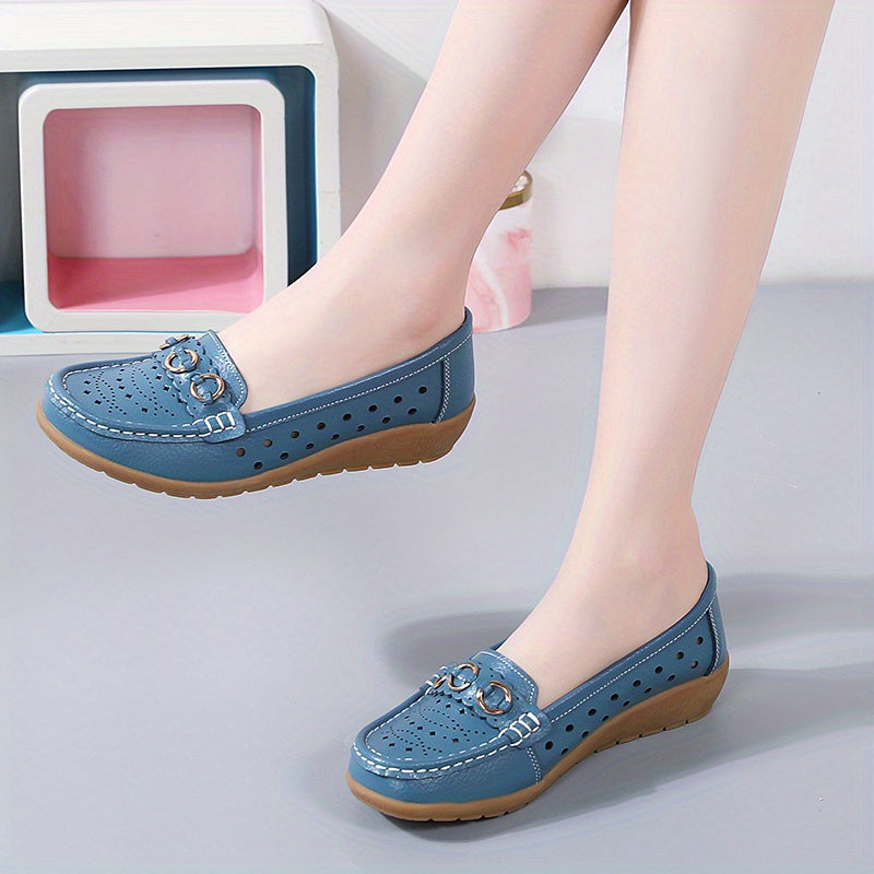 Flat shoes for women with hollow out design, casual and breathable slip-on style, providing comfortable wear.