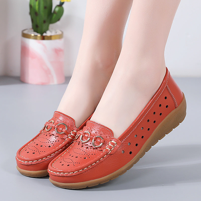 Flat shoes for women with hollow out design, casual and breathable slip-on style, providing comfortable wear.