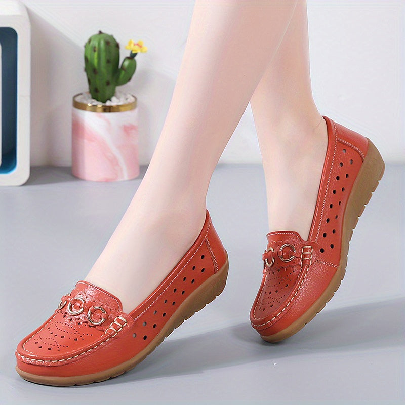 Flat shoes for women with hollow out design, casual and breathable slip-on style, providing comfortable wear.