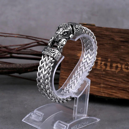 The Stainless Steel Viking Snake Head Bracelet for Men is built to last, with a fade-resistant, intricate design that exudes a punk rock style. A perfect gift for the fashion-forward man in your life, this dominant piece of jewelry will never lose its