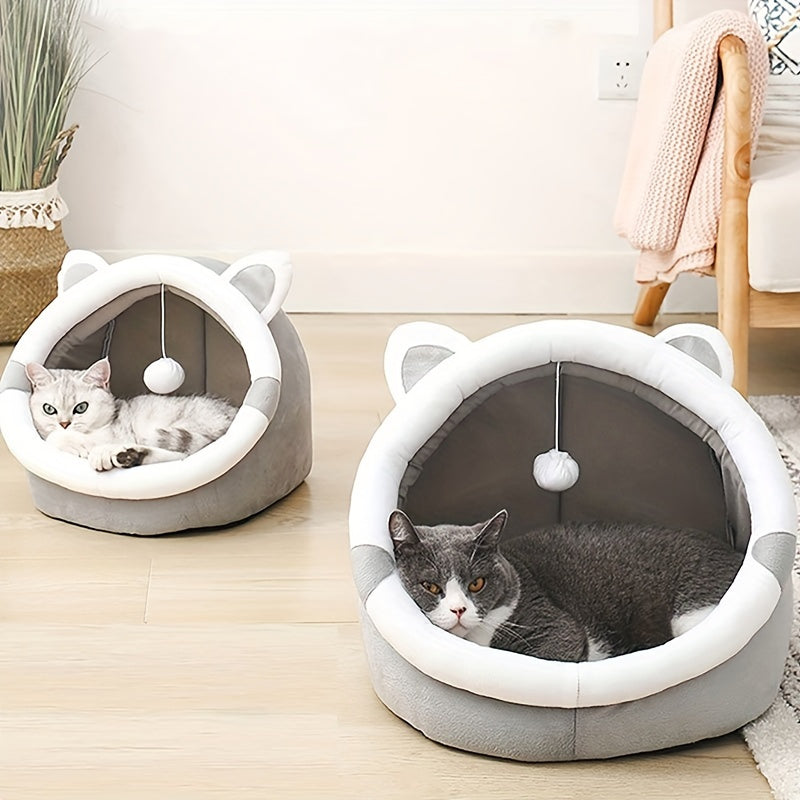 Cozy Cartoon Cat Cave Bed keeps your kitten warm and snug.