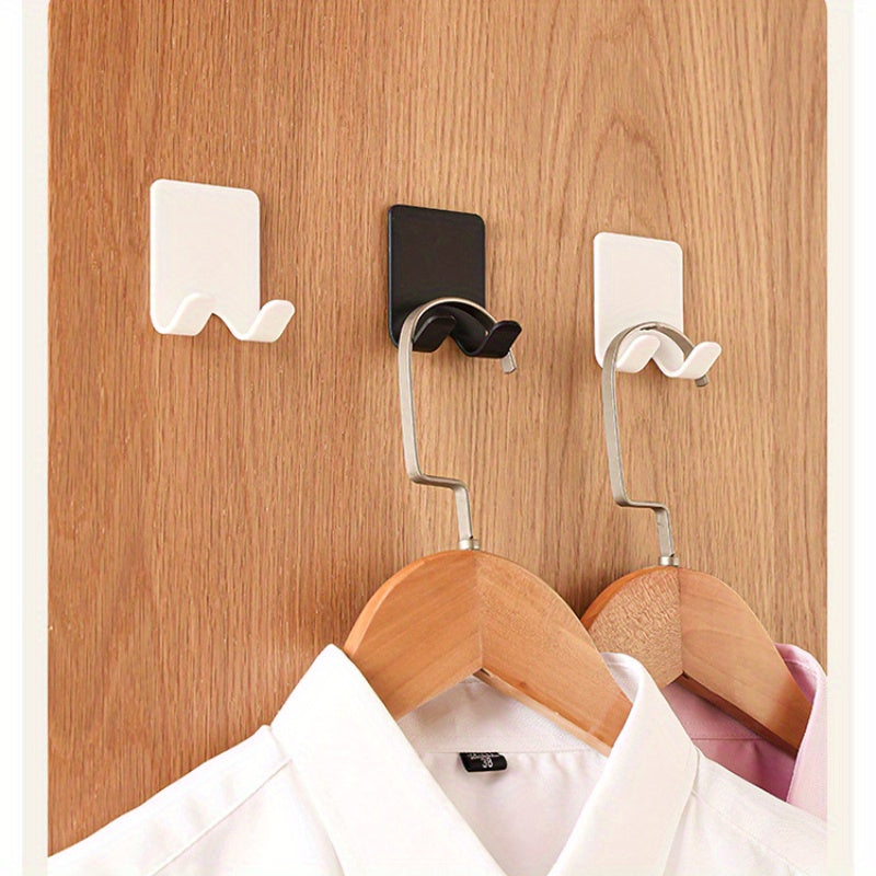 Multifunctional self-adhesive razor hook for bathroom, kitchen, and wardrobe. Pack of 2 or 4.