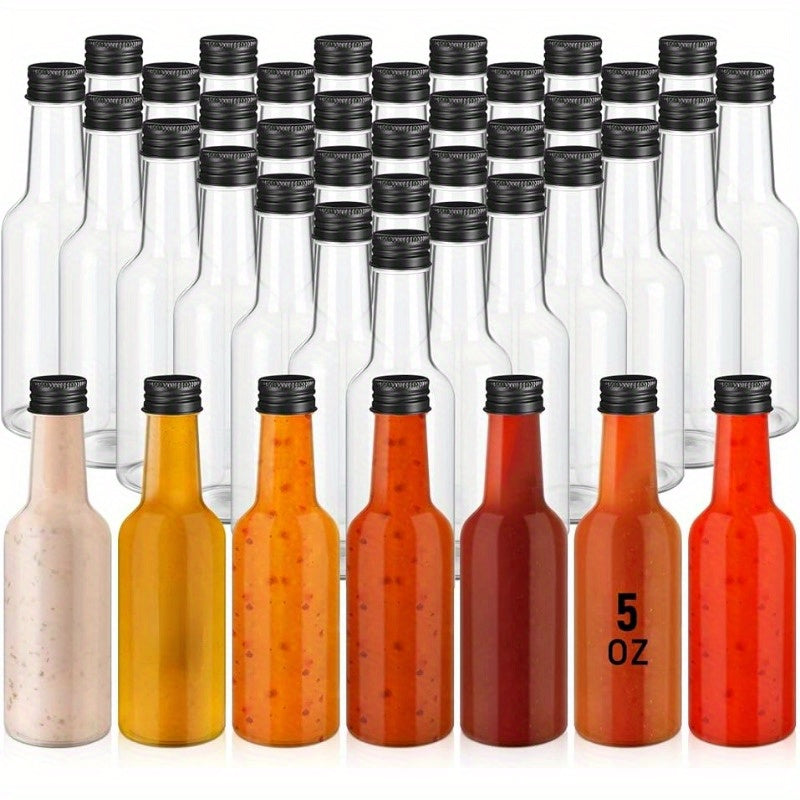 Get a set of 24 5oz Mini Clear Plastic Bottles with Leak-Proof Black Screw Caps, perfect for storing condiments, sauces, and liquor. Made of reusable, odorless PET plastic, these bottles are ideal for use in the kitchen, at parties, and during picnics.